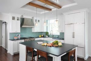 White kitchen with reclaimed wood beams and blue tile